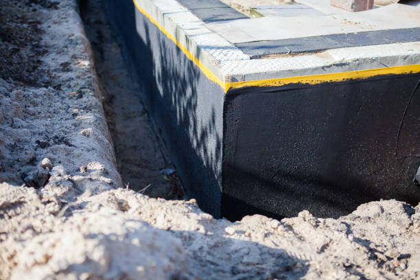 Professional Waterproofing technician working in Dunlap, IL